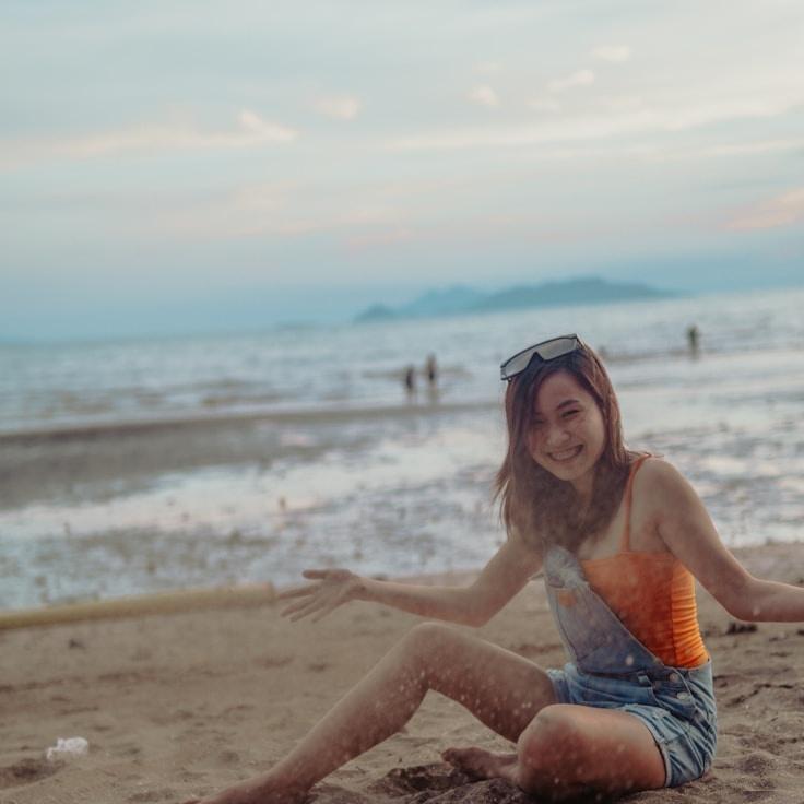 Kaveri Mehta, Lead Design Curator at Smooth Island Weave, reviewing corporate floral arrangements